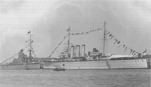 HMAS Canberra in happier times – shortly after commissioning in UK and before sailing for Australia, she was present during a visit by King George V to the Fleet at Portsmouth. Seen here manning ship in preparation to cheering the King, passing in his steam barge from the Flagship, Home Fleet, the new battleship HMS Nelson. 