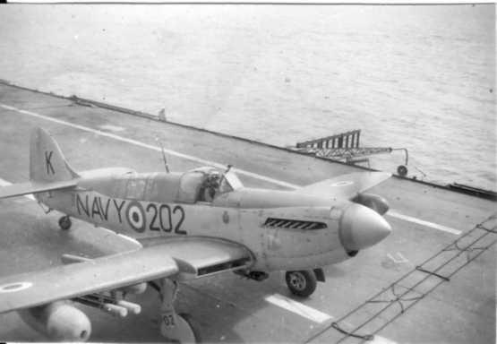 Fairey Firefly AS Mk 6, 817 Squadron RAN. Probably in February 1955 aboard the aircraft carrier HMAS Sydney. The aircraft is taxying to the catapult prior to launch for rocket projectile firing. The aircraft is armed with four rocket projectiles with 60lb concrete heads. (Pilot and photo: John van Gelder)