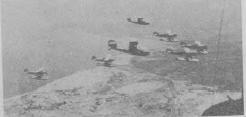 Seagull Vs (A2-1 and A2-12), Fairy IIIFs, and (left) Hawker Ospreys of the Mediterranean Fleet , flying above Aboukir Bay during the Abyssinian crisis - August 1936
