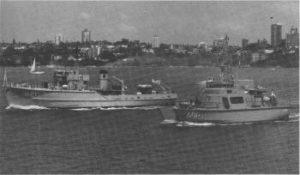 Past and present; the veteran Ton class minehunter HMAS Curlew with the new HMAS Shoalwater