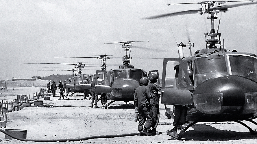 RAN Helicopter Flight Vietnam (RANHFV) Iroquois helicopters being refuelled at a base in South Vietnam.